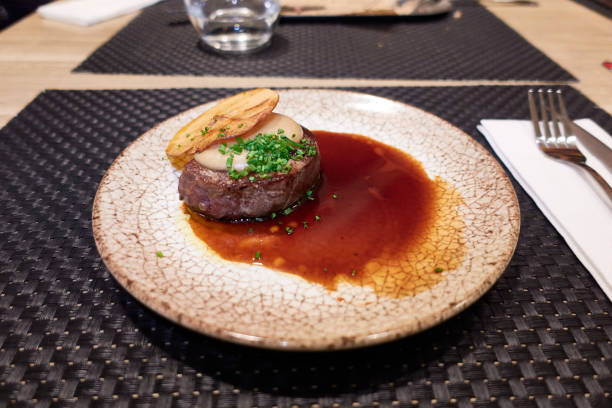istock Beef tenderloin with puree and crispy apple 2165202645