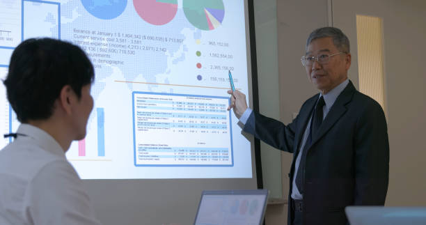 istock senior executive businessman do presentation 2165203562