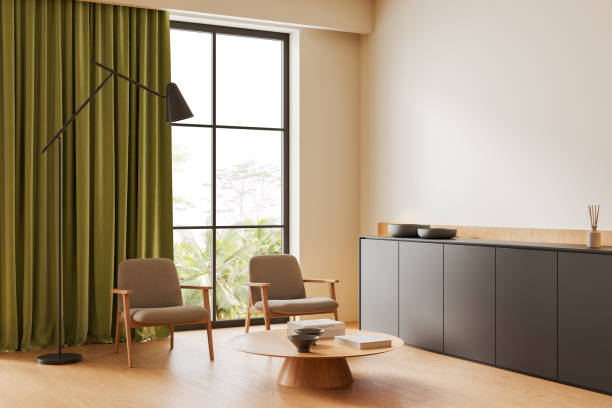 istock Modern living room interior with two armchairs and drawer, panoramic window 2165203594