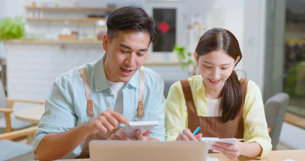 istock couple cafe small business owners 2165203850