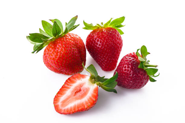 istock Overhead view of strawberries over white background 2165204006