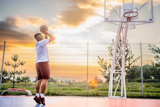 istock Man playing basketball stock 2165204812