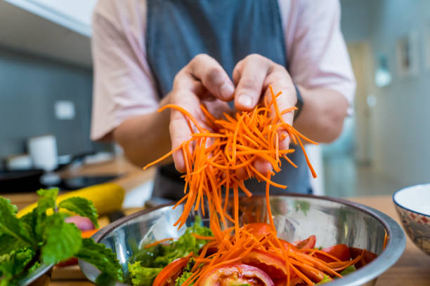 istock Chef at the kitchen preparing spicy glass noodle salad 2165213567