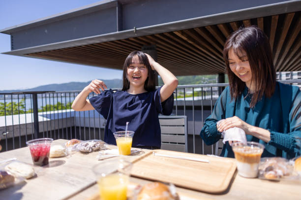 istock Family eating lunch on rooftop 2165213626
