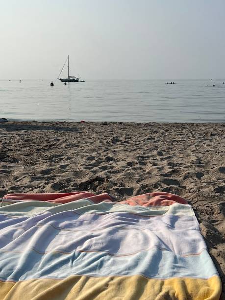 A calm summer day at Lake Ontario evokes a serene and nostalgic feeling.