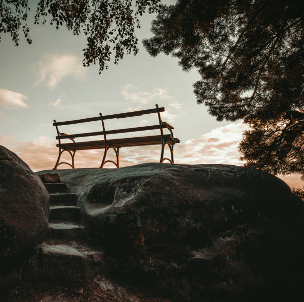 Mesmerizing view of Saxon Switzerland from a bench at sunset