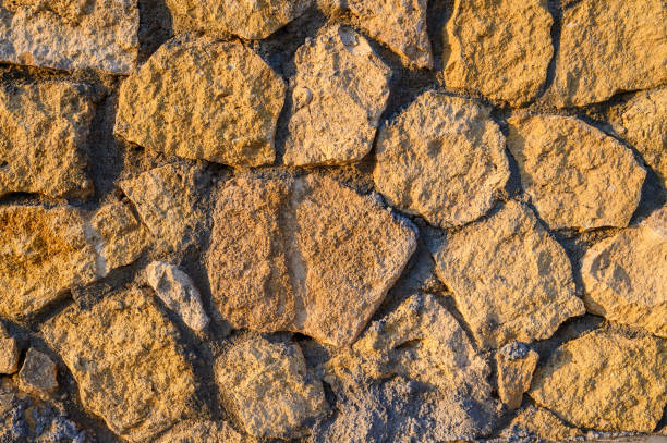 istock Natural beige white stone brick wall texture background 2165220709