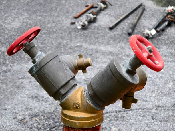 istock A detailed view of a fire hydrant with vibrant red handles 2165237298