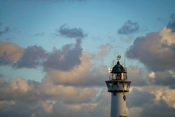 Egmond aan Zee , Netherlands. Van Speijk lighthouse, landmark of the city.