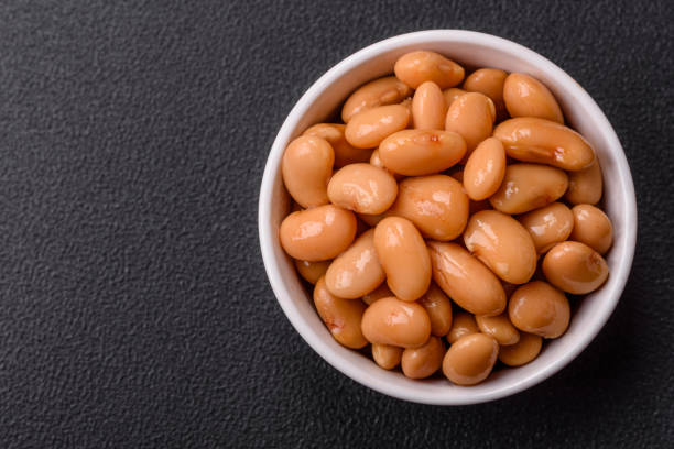 istock Delicious nutritious canned beans in tomato, with salt and spices 2165241251