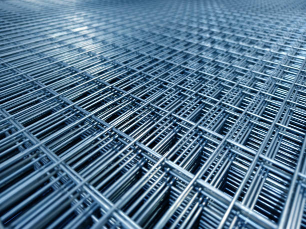 istock Steel chain link fence wire mesh texture and pattern 2165242188