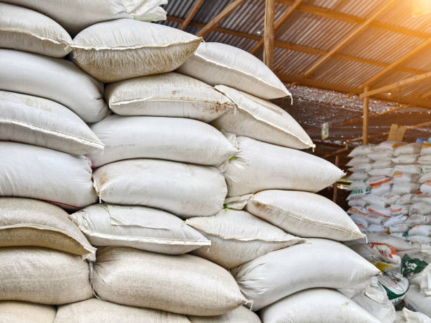 istock Stacking of big white bags in the modern warehouse 2165242281