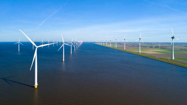 istock Majestic Windmill Park Along the Dutch Coast Beneath a Clear Blue Sky 2165244246