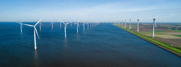 istock Majestic Windmill Park Overlooking Tranquil Waters In The Netherlands 2165245643