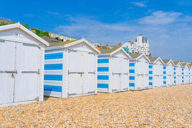 istock Pretty beach huts lined up on the beach of Hastings, England 2165247979