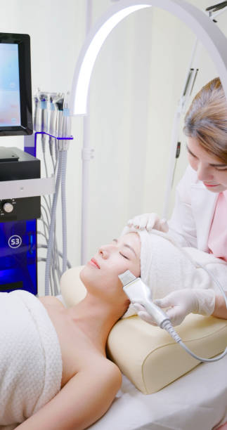 istock asian beautician use beauty tool 2165248007