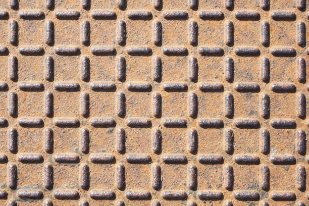 Anti slip metal shape texture. Orange rust iron background.