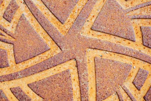 Orange rust iron background. Round steel symbol.
