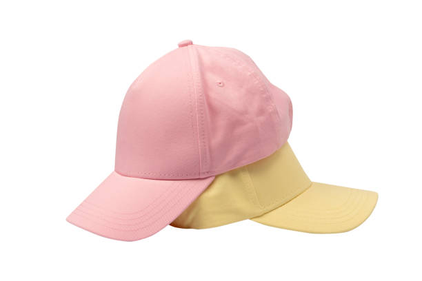 istock Pink and yellow cap isolated on white background. 2165255982