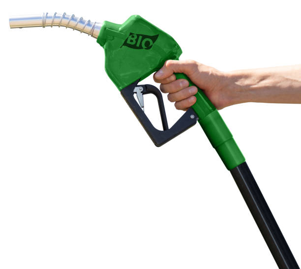 istock Hand with green refueling nozzle with the inscription BIO 2165256558