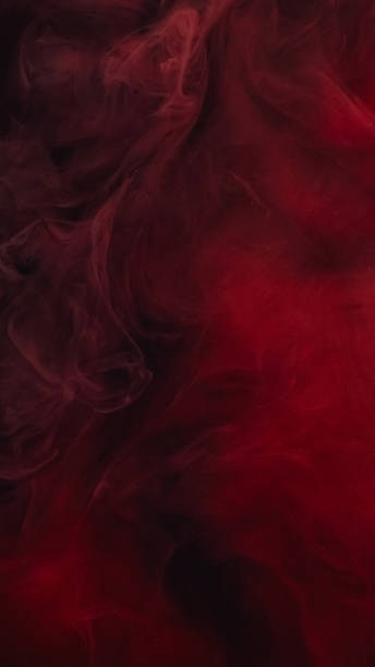 istock Dark mist flow ink water blend red black cloud 2165257894