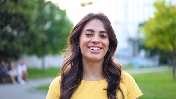 istock Smiling woman enjoying outside 2165259277