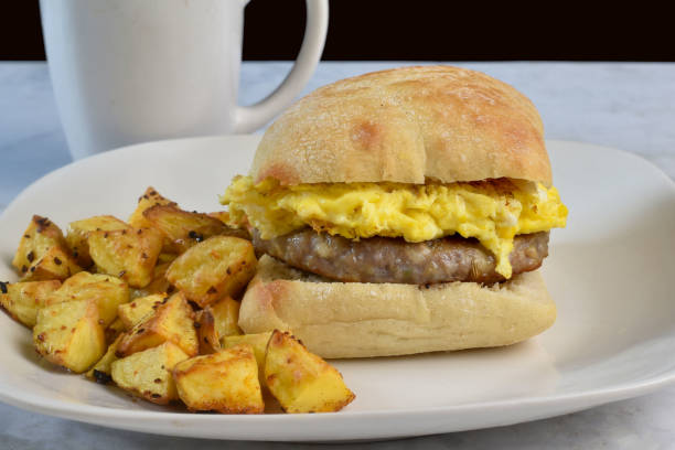 istock scramble egg and sausage patty breakfast sandwich, 2165262584