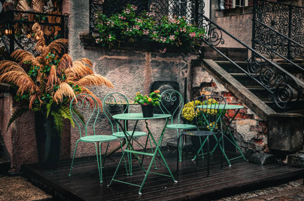 istock Fall sidewalk cafe. Autumn rainy cityscape 2165270497
