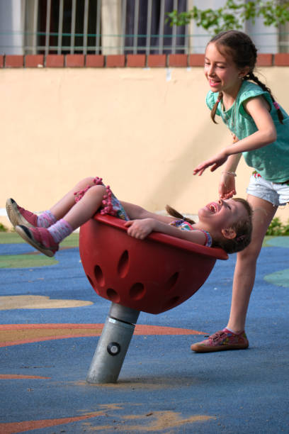 istock Unstoppable Laughter on the Playground 2165271408