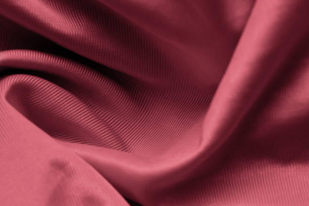 istock closeup of red ice silk textured background 2165271525