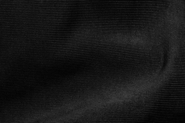 istock closeup of black ice silk textured background 2165271563