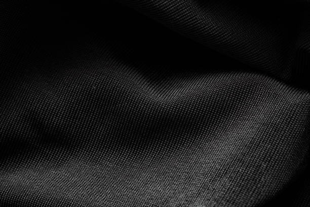 istock closeup of black ice silk textured background 2165271579