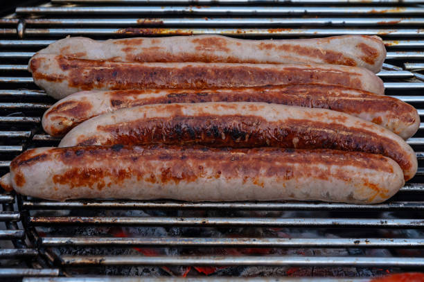 tasty thuringian sausages on a charcoal grill