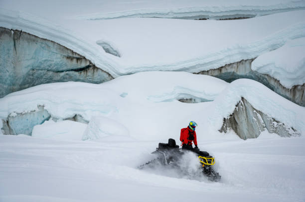 istock Guide and guests on ice-cave tour 2165282870