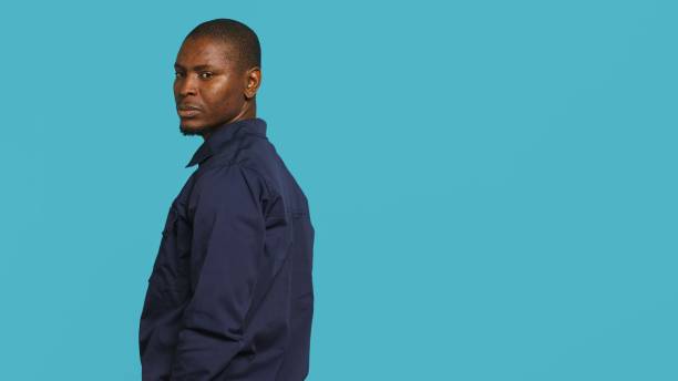 istock Portrait of security guard overseeing premises turning around 2165283043