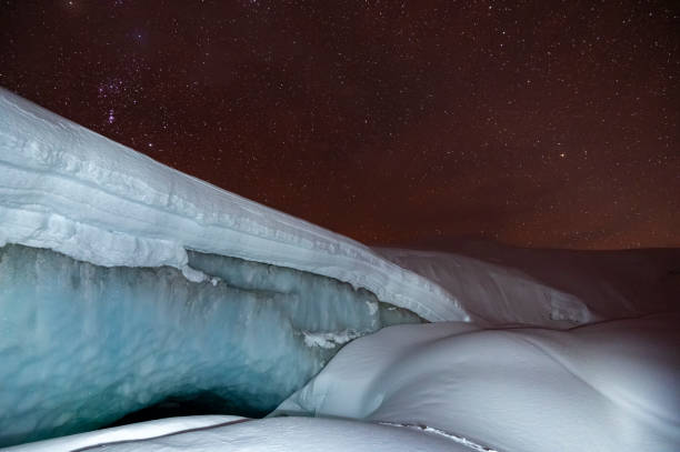 Mouth of glacier and glacier at night, British Columbia