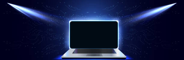 istock Illuminated Laptop Displaying Blank Screen Against Dark Background With Blue Highlights and Circuit Patterns 2165284990