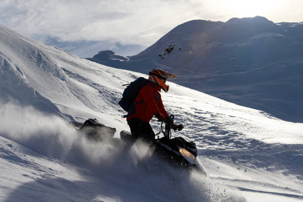 istock Backcountry snowmobiler rides across glacier 2165285321