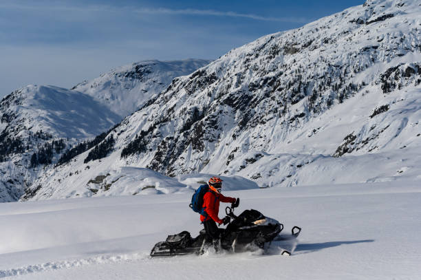 istock Backcountry snowmobiler rides across glacier 2165285354