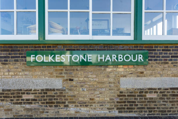 istock Folkestone harbor sign on green 2165285845