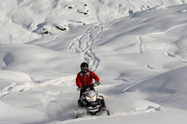 istock Backcountry snowmobiler rides across glacier 2165286181