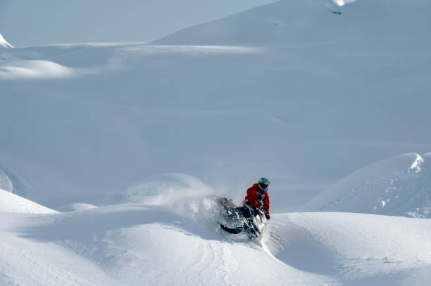 istock Backcountry snowmobiler rides across glacier 2165286221