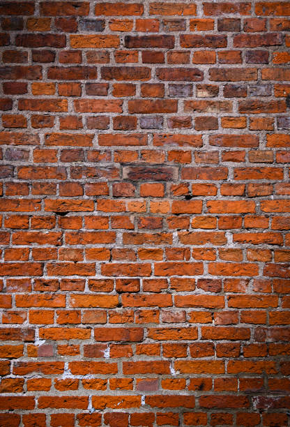 istock Brick wall of red color, old red brick wall texture background. 2165286230