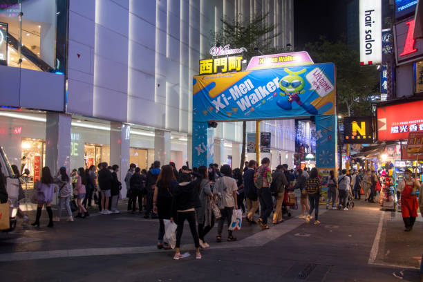 Taipei, Taiwan- 4 Dec, 2022: People visit Ximending shopping district in Taipei. Ximending is considered one of top shopping destinations in Taiwan, catering especially youth shoppers.