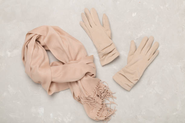istock Stylish autumn accessories on concrete background, top view 2165289316