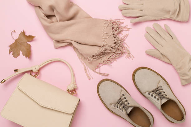 istock Stylish autumn accessories on color background, top view 2165289319