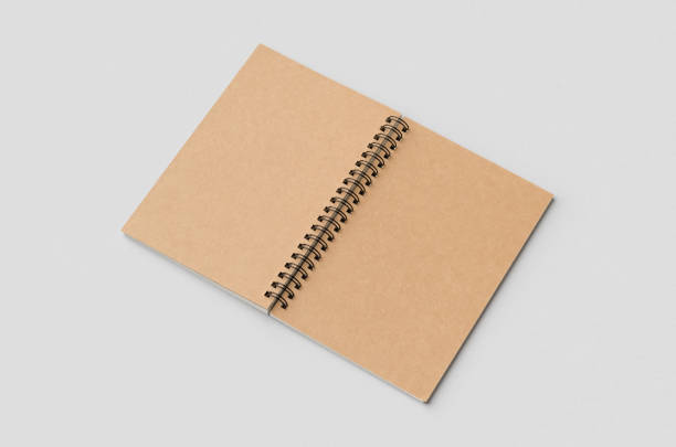 istock Kraft spiral notebook mockup, outside. 2165292357