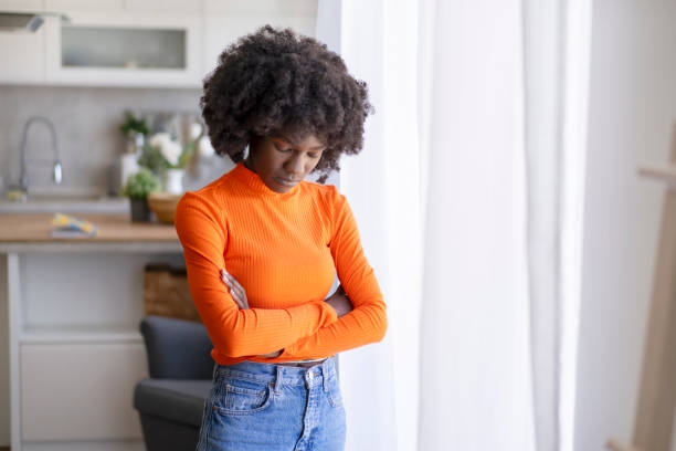 istock Depressed young african-american woman 2165292444