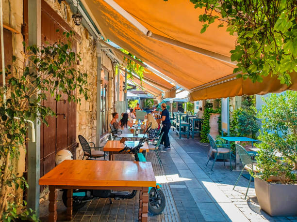 Limassol, Cyprus - July 15th 2023: The old town cafe with orange overhang