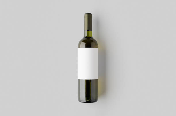 istock White wine in a green bottle mockup with a blank label. 2165292989